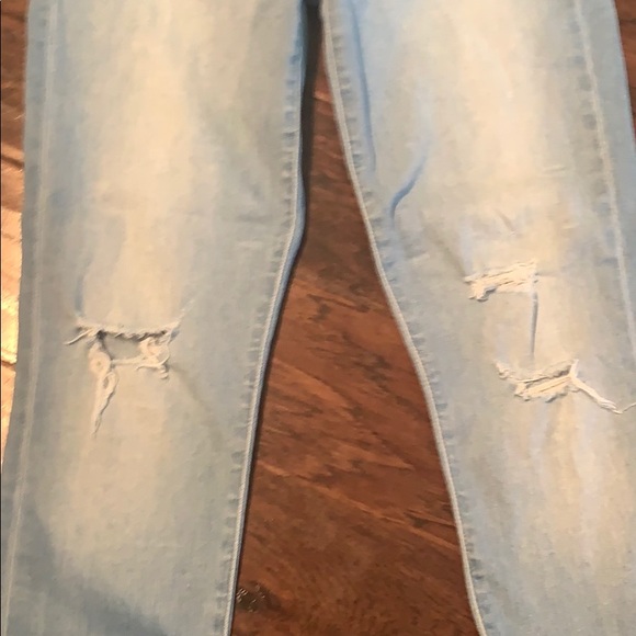 Barely worn light-denim skinny jeans with holes. - Picture 3 of 6